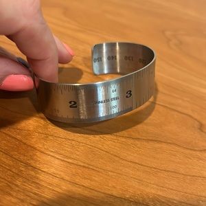 Thick banded ruler bracelet inches on outside centimeters on inside